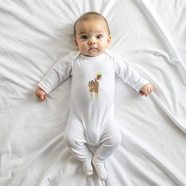 a baby is lying in her room wearing a white plai